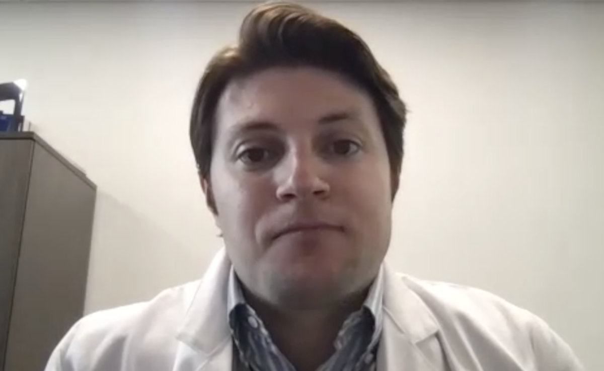 Jacob Taylor, MD, MPH, answers a question during a Zoom video interview