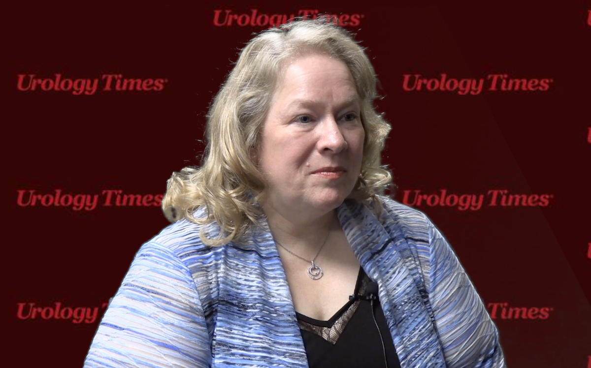 Arlene O. Siefker-Radtke, MD, answers a question during an interview. A virtual background contains the Urology Times logo