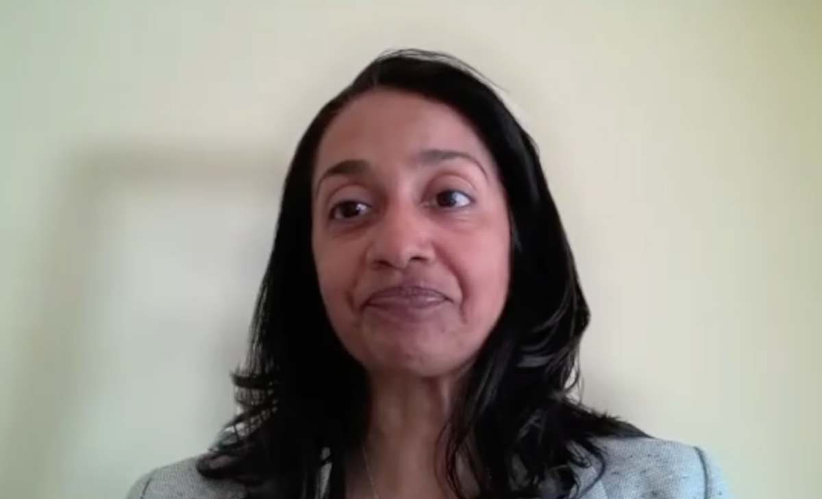 Veda Giri, MD, answers a question during a Zoom video interview