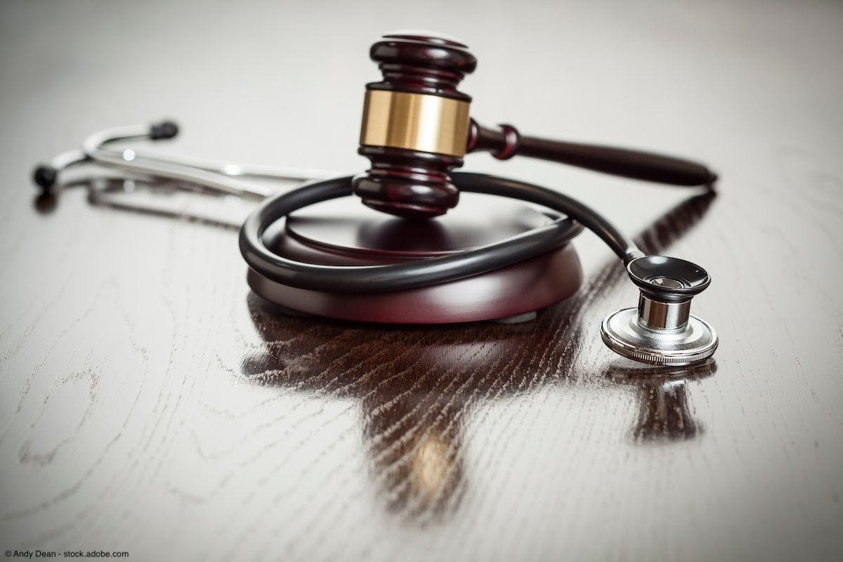 Gavel and stethoscope on reflective table | Image Credit: © Andy Dean - stock.adobe.com