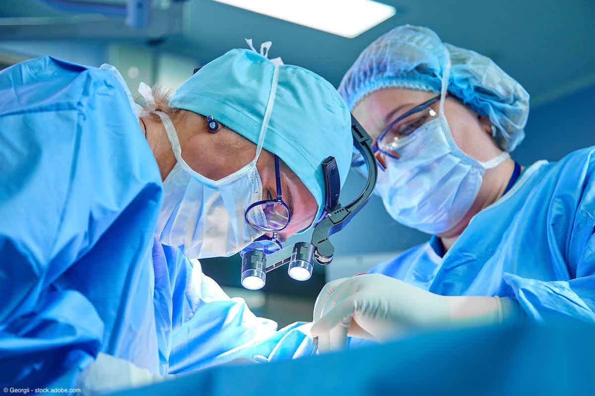 Male and female surgeon performing surgery | Image Credit: © Georgii - stock.adobe.com 